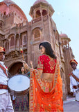 Beautiful Saffron Orange Lehenga With Heavy Hand Embroidery From Banaras