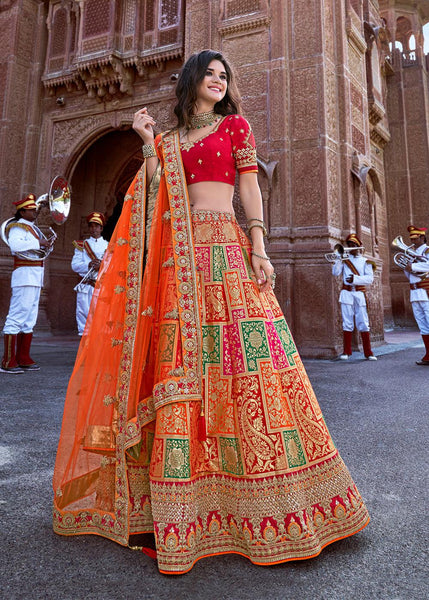 Beautiful Saffron Orange Lehenga With Heavy Hand Embroidery From Banaras