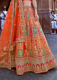 Beautiful Saffron Orange Lehenga With Heavy Hand Embroidery From Banaras