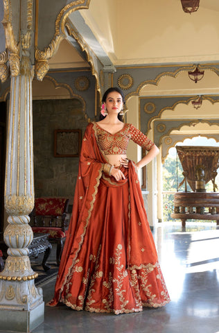 Orange Color Rangoli Silk Sequins And Thread Embroidery Work Lehenga Choli For Woman