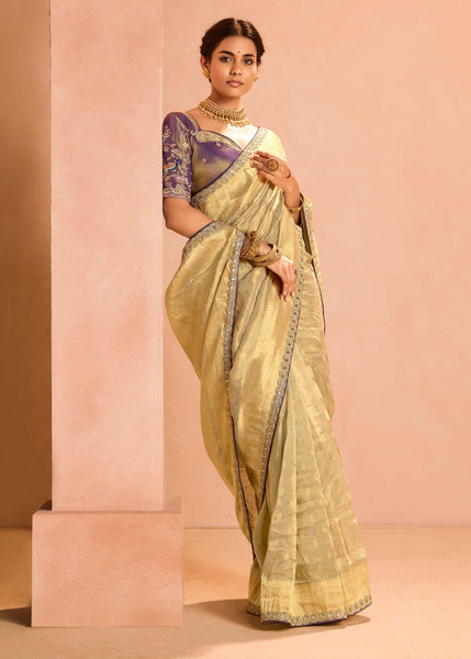 Dusky Cream Woven Banarasi Designer Tissue Silk Saree With Embroidered Blouse