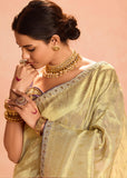 Dusky Cream Woven Banarasi Designer Tissue Silk Saree With Embroidered Blouse
