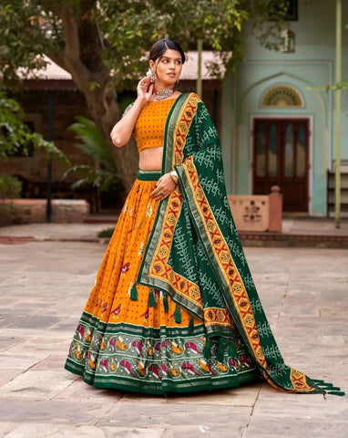Mustard Colored Tussar Silk Patola Printed Festive Wear Lehenga Choli - women's fashion mart