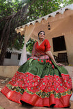 Foil Printed Designs On Mehendi Green Color Lehenga Choli In Dola Silk Fabric.