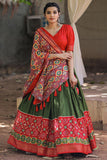 Foil Printed Designs On Mehendi Green Color Lehenga Choli In Dola Silk Fabric.