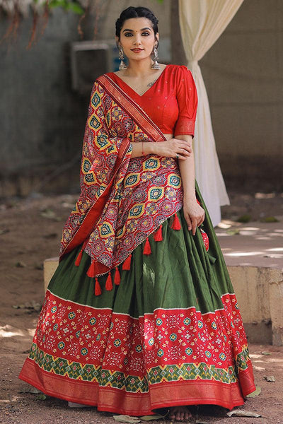 Foil Printed Designs On Mehendi Green Color Lehenga Choli In Dola Silk Fabric.