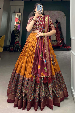 Art Silk Fabric Captivating Mustard Color Foil Printed Lehenga.