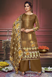 Marvellous Printed Work On Muslin Fabric Salwar Suit In Chikoo Color.