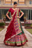Art Silk Fabric Green Color Stylish Look Patola Style Foil Printed Lehenga.