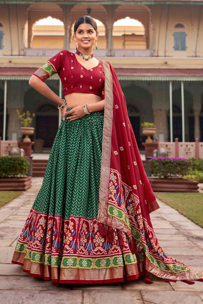 Art Silk Fabric Green Color Stylish Look Patola Style Foil Printed Lehenga.