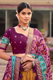 Art Silk Fabric Mustard Color Beatific Look Patola Style Foil Printed Lehenga.