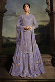 Sonal Chauhan Appealing Embroidered Work On Net Fabric Sharara Top Lehenga In Lavender Color.