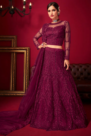 Embroidered Magenta Color Lehenga Choli In Net Fabric.