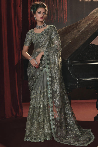Net Olive Color Heavy Embroidery Work Tempting Saree With Party Look Blouse.