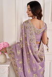 Embroidered Designs On Lavender Color Aristocratic Art Silk Fabric Saree.