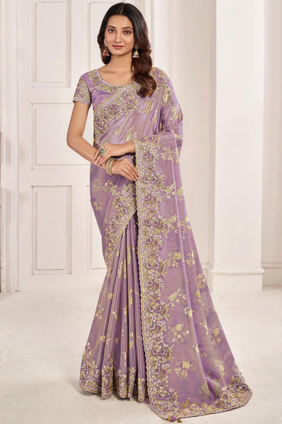 Embroidered Designs On Lavender Color Aristocratic Art Silk Fabric Saree.