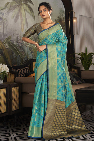 Appealing Weaving Designs On Festive Look Art Silk Saree In Cyan Color.
