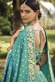 Banarasi Silk Fabric Sea Green Color Pleasance Lehenga With Jacquard Work.