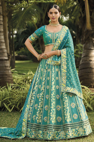 Banarasi Silk Fabric Sea Green Color Pleasance Lehenga With Jacquard Work.