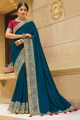 Banglori Silk Fabric Teal Color Patterned Saree With Border Work.