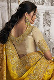 Appealing Heavy Embroidery Work Fancy Fabric Yellow Saree With Party Look Blouse.