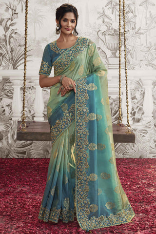 Sea Green Color Imperial Heavy Embroidery Work Fancy Fabric Saree With Party Look Blouse.