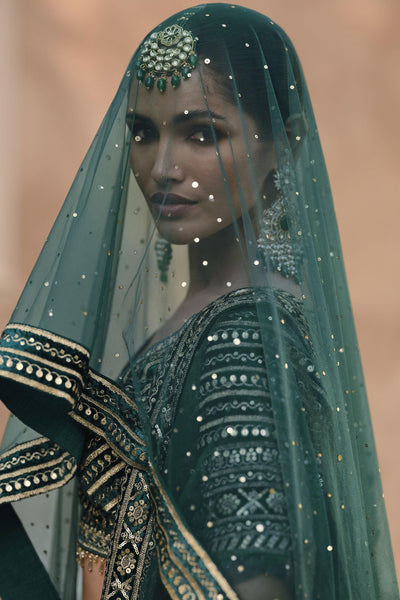 Vartika Singh Dark Green Color Lycra Fabric Bridal Lehenga Choli With Embroidery Work.