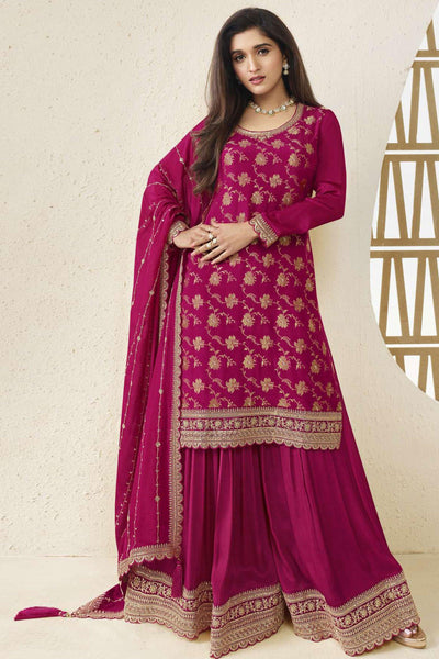 Nidhi Shah Chinon Jacquard Fabric Fancy Embroidered Palazzo Salwar Kameez In Magenta Color.