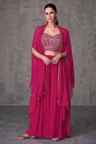 Diksha Singh Ingenious Rani Color Georgette Readymade Indo Western Palazzo With Shrug.