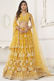 Alluring Yellow Designer Embroidered Lehenga Choli In Net Fabric With Blouse.
