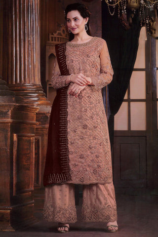 Alluring Net Fabric Peach Color Embroidered Palazzo Suit.