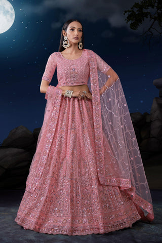 Wedding Wear Pink Color Fascinating Sequins Work Net Fabric Bridal Lehenga.