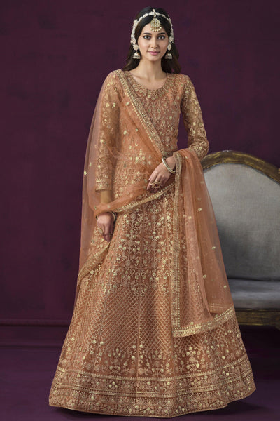 Beautiful Peach Color Embroidered Anarkali Suit In Net Fabric.