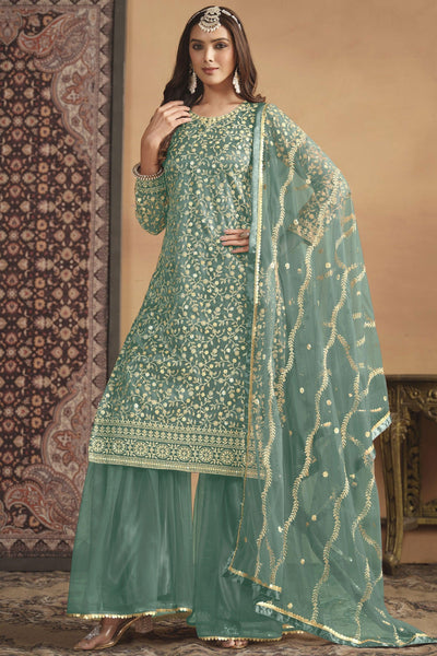 Appealing Festival Wear Net Fabric Palazzo Suit In Sea Green Color.