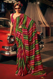Embellished Maroon And Green Leheriya Printed Art Silk Saree.
