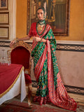 Comforting Dark Green Silk Designer Patola Saree - women's fashion mart