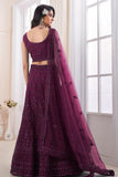 Wine Wedding Wear Net Fabric Lehenga Choli.