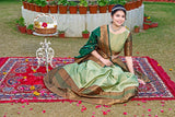Glimmering Zari Weaving Work Pista Color Lehenga Choli