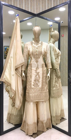 Mesmerizing  Embroidery Work Cream Color Sharara Suit