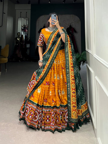 Mustard Color Patola Print With Gamthi Work Lace And Foil Work Tussar Silk Chaniya Choli - women's fashion mart