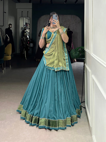 Teal Color Zari Weaving Work With Lace Border Rayon Lehenga Choli
