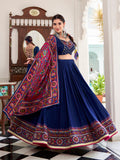 Navy Blue Color Gamthi Print And Embossed Design Tussar Silk Lehenga Choli