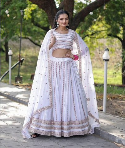 Magnetic White Faux Georgette Coding Embroidered Lehenga Set - women's fashion mart