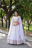 Magnetic White Faux Georgette Coding Embroidered Lehenga Set - women's fashion mart